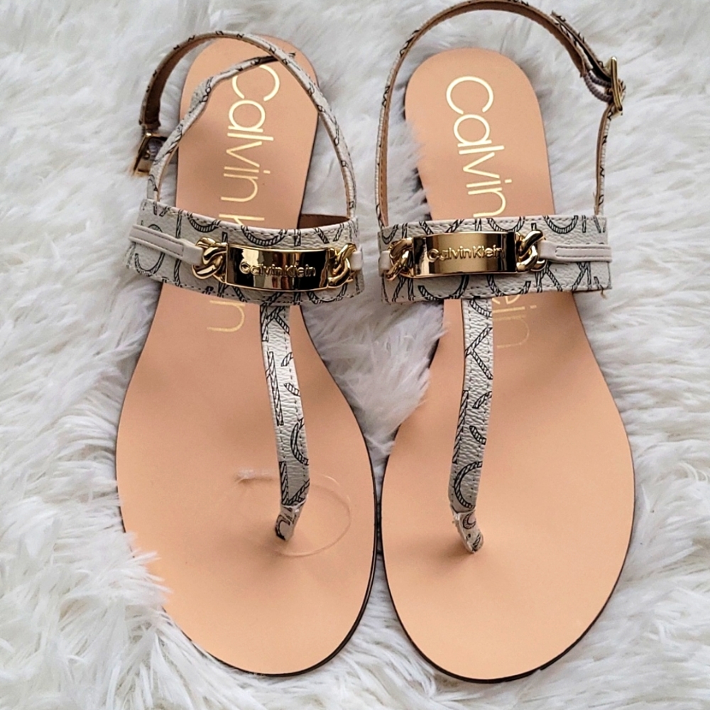 A new pair of Calvin Klein sandals for sale!